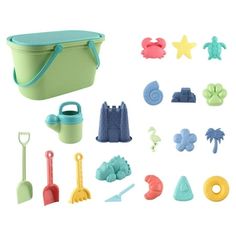 a play set with toys like sand, shovels and other items on a white background