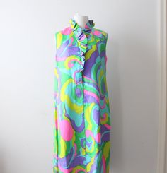 "38\"bust 40\"free waist 40\"long small/ medium womens vintage 1960s-70s dreamy print dress good condition/ see pics/ some wear / priced AS IS 1970s RARE easy care and wear retro print wear dressy or casual Thank YOU and please feel free to ask me any ?s:) Have a lovely day!! xoxo www.etsy.com/shop/retroandme" Pink Abstract Print Vibrant Dress, Retro Summer Dresses With Bold Print, Retro Bold Print Summer Dress, Vibrant Pink Dress With Bold Print, Groovy Retro Print Summer Dress, Summer Dresses With Groovy Retro Print, Groovy Summer Dress With Retro Print, Pink Dresses With Bold Print For Spring, Pink Retro Print Summer Dress