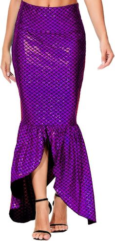 a woman wearing a purple mermaid skirt with fish scales on the bottom and black heels