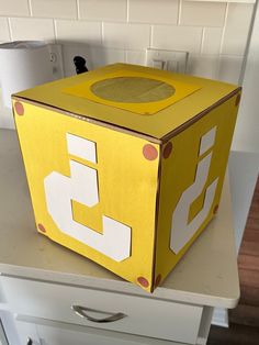 a yellow box sitting on top of a counter