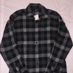 Casual Black And Dark Grey Plaid Flannel. Measurements Chest: 32-35 Inches. 100% Cotton. Never Worn! Classic Black Flannel Shirt With Buttons, Black Collared Flannel Shirt With Buttons, Black Collared Flannel Shirt, Fitted Long Sleeve Casual Flannel Shirt, Black Button-up Casual Flannel Shirt, Classic Black Flannel Top, Black Long Sleeve Flannel Shirt, Black Flannel Top For Fall, Black Flannel Shirt With Button Closure