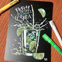 a drawing of a drink with limes and lemon wedges on the table next to it