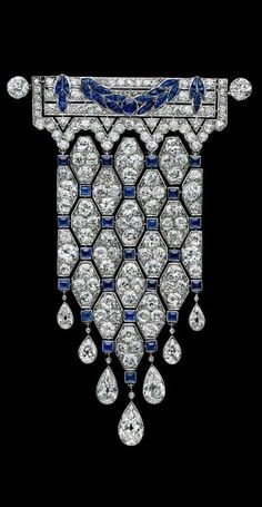 "Specification:- *Diamond Material : Cubic Zirconia  *Diamond Cut : Pear, Princess & Round Cut *Diamond Color : White, Blue *Diamond Clarity : VVS *Brooch Length : 60.00 MM *Brooch Width : 40.00 MM *Making Process: Handmade by our Experienced Staff. *Stamp: Our All Brooch Stamped According to metal Purity (925 SIL/10K/14K/18K). Custom Order:- *We do Accept Custom order. *Buyer can also request customization in listed Items (Charges apply according to required Customization). Customization:- *Buyer can Request change of rhodium color in 925 Silver Jewelry (No additional Charge). *In Gold (10K, 14K, 18K) buyer can change gold color (White, Rose, Yellow). *Buyer can also change CZ Stone Color (No additional Charge). Free Engraving:- *We Provide Free Engraving Service. *If your ordered Jewelry Sapphire Brooch, Bijoux Art Deco, Bijoux Art Nouveau, Wedding Brooch, Diamond Brooch, Art Nouveau Jewelry, Art Deco Stil, Silver Art, Deco Jewelry