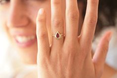 Yellow Gold Teardrop Jewelry For Proposal, Gold Teardrop Rings For Proposal, 14k Gold Pear-shaped Ruby Ring For Wedding, Pear-shaped Ruby Ring With Rose Cut Diamonds For Wedding, Gold Teardrop Diamond Ring For Proposal, Dainty Gold Ruby Ring For Proposal, Teardrop Yellow Gold Ruby Ring For Wedding, Dainty Teardrop Ring For Anniversary, Dainty Teardrop Anniversary Ring