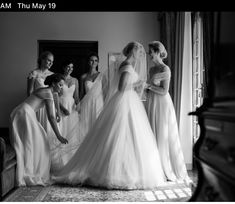 the bride and her bridesmaids are getting ready for their wedding