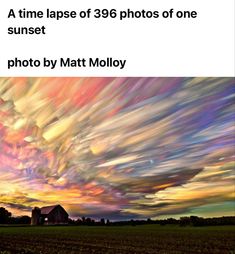 the sky is filled with colorful clouds over a farm