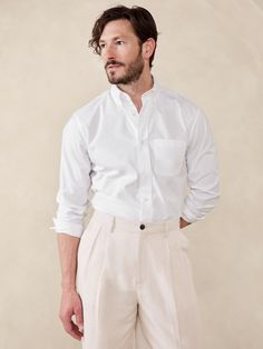 Designed for ease of wear and care, this sleek dress shirt employs a special cotton fabric with PUREPRESS™ cotton technology, a special process that smooths and protects the fabric, resulting in a wrinkle-resistant finish.  Standard fit.  Button-down collar.  Chest pocket.  Shirttail hem.  Standard fit.  Long sleeves.  Hip length.  Model: Size M, 6'2" (188cm). Sleek Dress, White Shirt Men, Men Stylish Dress, Pink Plaid, Button Down Collar, Mens Shirt Dress, Blue Plaid, Shirt White, White Shirt