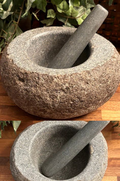 two stone mortars sitting on top of a wooden table