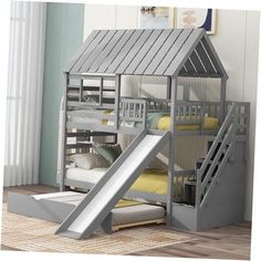 a child's bunk bed with a slide next to it