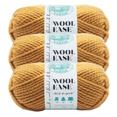 three balls of wool ease yarn