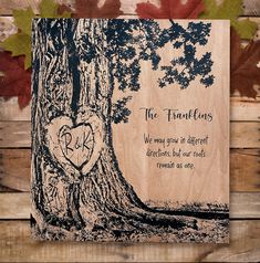 a wooden plaque with an image of a tree and the words, the true love