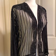 Beautiful Beaded Duster Kimono In A Sheer Fabrication And Fringe Detailing At Bottom. Intricate Beadwork Lends An Ethereal Touch To This Delicate Layer. Color: Black Open Front Beaded Embellishments At Cuffs 3/4 Sleeves Beaded Throughout Sheer Polyester Muche Et Muchette Excellent Condition No Damage. New Without Tag. Elegant Black Open Front Top, Elegant Fitted Open Front Tops, Elegant Beaded Tops For Night Out, Elegant Beaded Tops For Evening, Elegant Beaded Evening Top, Elegant Beaded Black Tops, Elegant Black Beaded Top, Elegant Beaded Long Sleeve Tops, Elegant Long Sleeve Beaded Tops