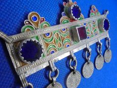 This lovely piece is in perfect shape and can be made into a taounza/headdress or into a necklace that hangs on the chest, it has no flaws and the enamel is bright. Size- 4 inches wide, 2 3/4 inches long. Weight-48 grams. Traditional Coin Necklaces For Collectors, Traditional Coin Necklaces As Collectibles, Moroccan Jewelry, Old Coins, Silver Enamel, Silver Bangles, Jewelry Vintage, Headdress, Pendant Necklaces