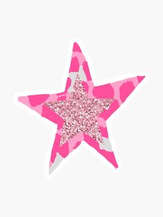 a pink and white star sticker with glitter on it's side, against a white background