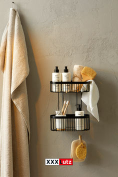 a bathroom shelf with two shelves holding various items