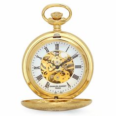 PRODUCT DESCRIPTIONThis sleek gold-tone pocket watch, by Charles Hubert of Paris, is designed with a dual-opening cover that also acts as a stand for displaying on desk or night table. The watch cover is embossed with an ornate design on front and back, with a clear viewing window and black Roman numerals on the front cover. Inside, a white chapter ring surrounds the visible inner mechanism, with black Roman numerals and hands. The watch and matching 12" chain come packaged in a signature Charle Gold Self-winding Pocket Watch With Round Dial, Gold Self-winding Pocket Watch, Gold Self-winding Pocket Watch As Gift, Classic Gold Pocket Watch With Skeleton Dial, Compact Gold Pocket Watch Gift, Personalized Playing Cards, Liquor Flask, Flask Set, Mechanical Pocket Watch