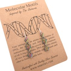 My handcrafted DNA strand earrings make a fun and unique fashion statement for the lover of biology & genetics, or for someone you care about whom shares your DNA! These earrings are available in silver color, metallic rainbow, 18k Gold and 18k Rose Gold finish. Comes on Sterling Silver ear wires, 14k Gold Filled, or 14k Rose Gold filled ear wires (depending on finish color selected). ✦ DETAILS ✦ * Hand-cast from Upcycled Alloy * Comes with Sterling Silver ear wires, 14k Gold Filled, or 14k Unique Rainbow Earrings With Ear Wire, Rainbow Metal Earrings With Ear Wire, Dna Earrings, Biology Jewelry, Dna Strand, Dna Jewelry, Metallic Rainbow, Colorful Gifts, Themed Jewelry