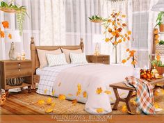 a bedroom decorated in fall colors with leaves falling from the ceiling and on the bed