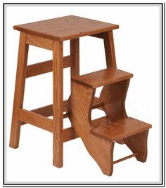 a wooden stool and step stool are shown