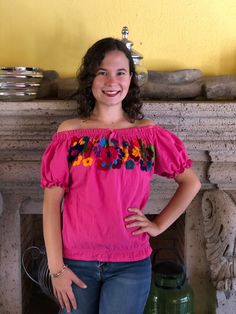 Beautiful Mexican top with floral embroidery, spring in the waist, neck and sleeves, hand embroidered by artisans from Oaxaca, Mx, it is a unique piece to make you look spectacular on any occasion. This blouse comes as a one size ideal for Small and Medium sizes. Blouse made by artisans from Oaxaca, Mx. Mexican textile art has centuries of history and creativity throughout the country. Mexico is recognized as one of the leading countries with a beautiful aristic production in the textile world, Bohemian Short Sleeve Tops For Spring, Traditional Floral Embroidered Tops With Relaxed Fit, Spring Short Sleeve Blouse With Boho Collar, Bohemian Embroidered Relaxed Fit Blouse, Traditional Festival Tops With Relaxed Fit, Spring Boho Collar Short Sleeve Tops, Spring Hippie Short Sleeve Tops, Traditional Relaxed Fit Tops For Festivals, Bohemian Embroidered Summer Top