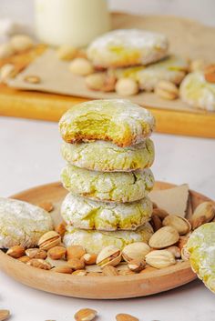 a stack of cookies sitting on top of a wooden plate