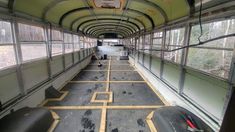 the inside of an old bus is being renovated