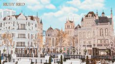 an image of a city street with buildings and trees in the winter time, as well as snow on the ground