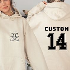 "Elevate your game day look with our Custom Hockey Sweatshirt! Ideal for the devoted hockey mom, this cozy hoodie is a thoughtful Mother's Day gift. Show off your team pride in comfort and style. Order now to make her feel appreciated on her special day!" Welcome to VickyTeeDesign Shop! How to Order  * Please choose your t-shirt color and the shirt size by the drop-down menus * Enter the design idea or the personalization if you would like. * Please feel free to ask any questions. My Shirt Mater Embroidered Hockey Vest, Casual Customizable Hoodie For Sports Events, White Team Logo Hoodie For Game Day, Customizable Casual Sports Hoodie, Customizable Cotton Hoodie For Sports Events, Customizable White Hoodie For College, Customizable Sporty Hoodie For Game Day, Customizable Cotton Team Spirit Hoodie, Customizable Fan Apparel Hoodie For Sports Events