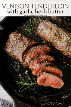 steaks cooking in a skillet with herbs