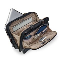 The ideal choice for those who need to expand on demand. The @work Medium Expandable Brief offers all the features and functionality of our collection with the unique ability to add 2.5 inches of increased packing space for those last-minute travel needs. Accommodates most 15.6" laptops. Height Width Depth Weight US 12 in 16.5 in 5.5 in 3.0 lbs EU 30.5 cm 42 cm 14 cm 1.3 kg Section Design, Travel Needs, Rolling Bag, Luggage Shop, Sac Lunch, Professional Fashion, Carry On Luggage, One Bag, Day Bag