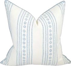 a white and blue striped pillow on a white background