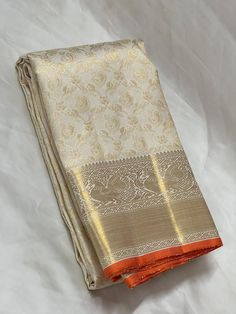 Bridal Collection Beige Color Pure Kanchipuram Silk Saree | Indian Traditional Ethnic Saree | Wedding or Party Wear Saree | Handwoven Gift Saree for Her Product Details : Saree Type : Pure Kanchipuram Silk Saree Golden Zari, Silk Mark Certified Blouse Piece : Yes (Un-Stitched) Saree Length : 5.5 Meters Blouse Piece Length : 80 cm Saree Weight : 0.9 kg Saree Fabric : Pure Kanchipuram Silk  Color : As shown in the picture Work : weaving Pattern : designer Occasion: Party Wear, Formal Wear, Festiva Gold Brocade Pre-draped Saree With Zari Weaving, Semi-stitched Paithani Silk Saree For Wedding, Katan Silk Pre-draped Saree For Wedding And Diwali, Brocade Traditional Wear For Puja During Diwali, Gold Saree With Traditional Patterns In Tissue Silk, Gold Paithani Silk Blouse Piece For Eid, Traditional Cream Blouse Piece With Pallu, Cream Saree With Pallu For Navratri, Traditional Gold Tussar Silk Churidar