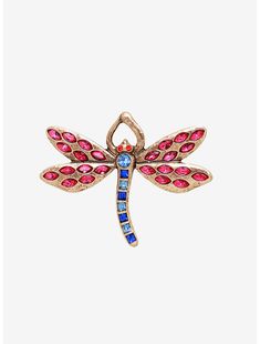 a pink dragonfly brooch with blue and red stones on it's wings