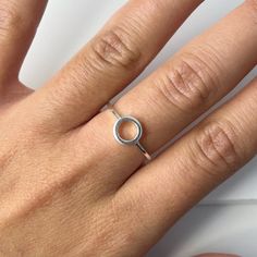 The simple Sterling Silver Karma Circle ring is a versatile, timeless ring and oh so comfortable to wear every day.  Circles symbolise endless love and unity, making it a perfect gift for yourself or a loved one. Wear it alone or in a stack, we think you'll love it 💖 Details 925 Sterling Silver Circle width: 7 mm See size chart as a guide Still not sure of your size? Contact me and/or consider purchasing a ring sizer - www.thejewellerytree.net 💕 Online store: www.thejewellerytree.net 💕 Stay up-to-date with new designs & special offers  - FOLLOW ME   Socials: @myjewellerytree OR  https://www.facebook.com/thejewellerytree1/  💕 Need more info, feel free to email - I'd love to help 💕And please visit my store https://www.etsy.com/au/shop/TheJewelleryTreeCo to see lots more quality sterling Everyday Hypoallergenic Stackable Open Rings, Everyday Hypoallergenic Open Midi Rings, Everyday Hypoallergenic Midi Rings, Simple Sterling Silver Rings For Everyday, Adjustable Initial Ring For Everyday, Minimalist White Gold Rings With Halo Design, Simple White Gold Midi Rings, Simple Hypoallergenic Everyday Rings, Minimalist Initial Ring With Round Band For Promise