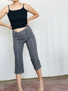 "90's Plaid Capri's Modeled on a S/M marked as size US 6 Made in Canada,  97% Cotton Waist: 29\" Hip: 34\" Length: 30\"" Fitted Casual Cropped Leg Capris, Fitted Mid-rise Fall Capris, Fitted Mid-rise Capris For Fall, Fitted Capri Length Pants For Fall, Casual Mid-rise Fitted Capris, 90s Style Mid-rise Pants For Fall, 90s Style Fitted Pants For Summer, 90s Inspired Fitted Cotton Bottoms, 90s Style Fitted Summer Pants