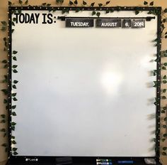 a white board with green leaves on it and the words today is, tuesday, august 6, 2009