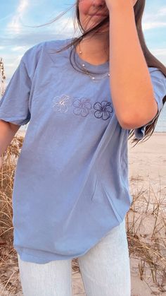 comfort colors Tee with 3 hibiscus' embroidered on the front! Blue Washed T-shirt For Spring, Blue Relaxed Fit T-shirt With Floral Embroidery, Light Blue Washed Cotton Tops, Embroidery Backing, Comfort Colors Tee, Clothing Co, Clothing Company, Denim Wash, Vintage Look