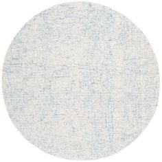 a round rug with blue and white colors