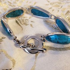 This 8" Bracelet Would Go Well With Jeans Or Pretty Outfit. Six Lovely Turquoise Agate Stones Wrapped In Sterling Silver. Toggle Clasp Marked 925. Never Worn. Linked Bracelet, Stone Wrapping, Toggle Clasp, Agate Stone, Silver Blue, Womens Jewelry Bracelets, Link Bracelets, Blue And Silver, Pretty Outfits