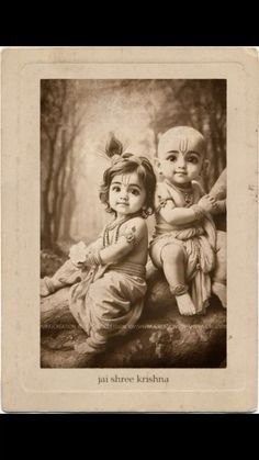 an old black and white photo of two children