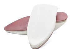 Moroccan Leather Babouche Basic Slippers in white, a contemporary pair of pointy shoes slippers in soft sheepskin leather. Handmade using the traditional techniques of skilled leather artisans just outside of Marrakech. This pair of leather slides will surprise you with its mild leather and the comfort it will bring to your feet. Hurry, take advantage of our best offers ever: 🌟 Buy 2 item And Get 30% OFF 🌟 Your discount Apply Automatically at Checkout 🌟 Buy 3 item And Get 40% OFF 🌟 Your disc White Leather Slip-on Slippers, White Pointed Toe Mules With Leather Sole, White Leather Slippers With Leather Footbed, White Leather Slippers With Leather Sole, White Leather Mules With Leather Footbed, White Slip-on Leather Shoes With Leather Footbed, White Leather Slip-on Shoes With Leather Footbed, White Slip-on Mules With Rubber Sole, White Leather Slippers With Rubber Sole