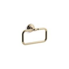 a brass towel ring on a white background