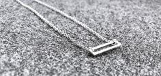 "Sterling Silver Open Rectangle Necklace A sleek, minimal, solid sterling open rectangle, suspended from a bright sterling silver cable chain. Sleek and contemporary. Versatile and ideal for layering and wearing everyday. Necklace shown above measures 16\" in length, end-to-end. Available in 6 lengths. Please make your selection from drop down menu. Necklace extender available here: https://www.etsy.com/listing/860614919/sterling-silver-extender-chain-necklace Open rectangle measures 20mm by 5mm Elegant Silver Rectangular Bar Necklace, Modern Silver Rectangular Necklaces, Modern Sterling Silver Bar Necklace, Modern Rectangular Necklace, Minimalist Rectangular Box Chain Jewelry, Minimalist Rectangular Link Necklace As Gift, Minimalist Necklace With Rectangular Links Gift, Modern Sterling Silver Bar Necklace For Gift, Modern Sterling Silver Bar Necklace As Gift