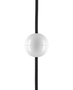 a black and white photo of a light fixture on a pole with a cord in front of it