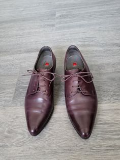 "Vintage oxblood dark red lace up shoes. Leather women`s flat oxfords with pointy toes. Size 7 UK.  Leather lining.  Brand: Hōgl (As an Austrian family company with a history of just under 90 years). condition: good, have some scratches and streaks on the back leather - photo No.10. Normal used vintage shoes. Look at the photos, please. measurements: Heels height 3 cm / 1.2\" in  Outsole length 31 cm / 12.1\" in bottom sole width in widest place 9,1 cm / 3.5\" in  SIZE:  UK 7 (labeled), eu 40 1/ Formal Lace-up Dress Shoes With Red Sole, Business Lace-up Dress Shoes With Red Sole, Formal Lace-up Shoes With Red Sole And Round Toe, Semi-formal Pointed Toe Oxfords With Branded Insole, Business Lace-up Leather Shoes With Red Sole, Business Leather Shoes With Red Sole, Fitted Pointed Toe Oxfords For Derby, Fitted Pointed Toe Oxfords With Rubber Sole, Pointed Toe Lace-up Shoes With Brogue Detailing For Work