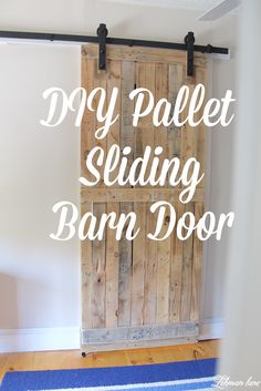 a diy pallet sliding barn door with the words diy pallet sliding barn door