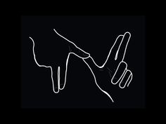 two hands reaching towards each other in the dark