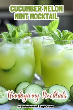 two glasses filled with cucumber melon mint cocktail next to sliced cucumbers