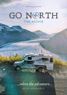 an rv parked on the side of a road with mountains in the background and text that reads go north the movie