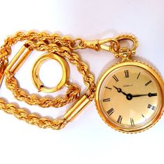 Gueblin Winding Pocket Watch Working And Tested 14kt. Yellow Gold 31.5 Grams. 30mm Diameter Total Length 12 Inches 4mm Caliber Chain Luxury Yellow Gold Pocket Watch With Chronometer, Gold Chronometer Watch Timeless Style, Gold Jewelry And Watches With Chronometer, Timeless Yellow Gold Pocket Watch For Evening, Elegant Yellow Gold Round Pocket Watch, Elegant Yellow Gold Pocket Watch For Formal Events, Elegant Yellow Gold Pocket Watch For Formal Occasions, Classic Hallmarked Yellow Gold Jewelry And Watches, Classic Hallmarked Yellow Gold Jewelry